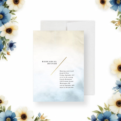 Rehearsal dinner invitation featuring cream and blue watercolor design, gold accent line, and customizable event details.-front