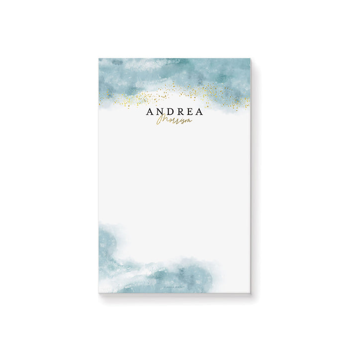Custom personalized notepad featuring a soft blue watercolor design, gold speckles, and a name.