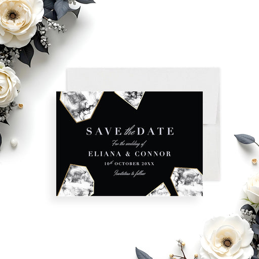 Black and white wedding save the date card with a marble geometric design-front