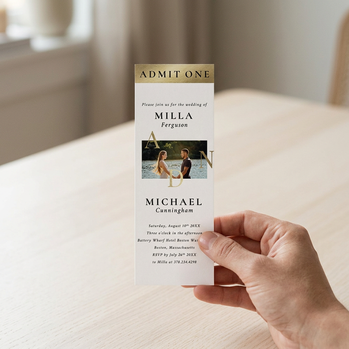 Wedding ticket invitation held for scale