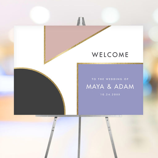 Modern geometric wedding welcome sign with blush, lavender, charcoal color blocks and gold accents