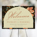 Wedding welcome sign featuring a vintage floral illustration and an arched design, personalized for a couple’s special day.