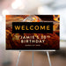 Custom whiskey-themed birthday welcome sign with amber ice background, ideal for men’s milestone parties and stylish event entrances.