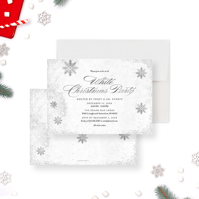 White Christmas party invitation featuring silver snowflakes for elegant holiday events-front-back