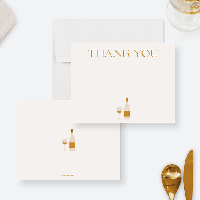 White dinner party thank you note card with gold-colored lettering and a wine bottle and glass illustration.