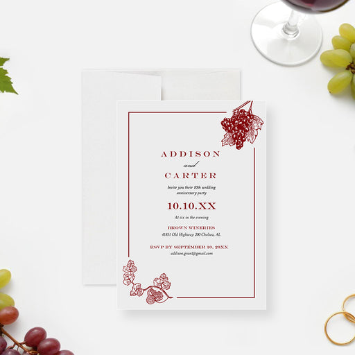 Wine-themed wedding anniversary invitation with a grape illustration and vineyard-inspired design.-front