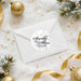 Envelope with a decorative sticker labeled 'Sparkle & Shine' surrounded by Christmas ornaments and decorations.