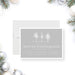 Winter wonderland party invitation featuring snowy trees on a soft gray background with elegant typography, perfect for holiday celebrations.-front