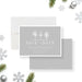 Winter wonderland save the date card featuring snowy trees on a soft gray background with elegant minimalist typography.-front-back