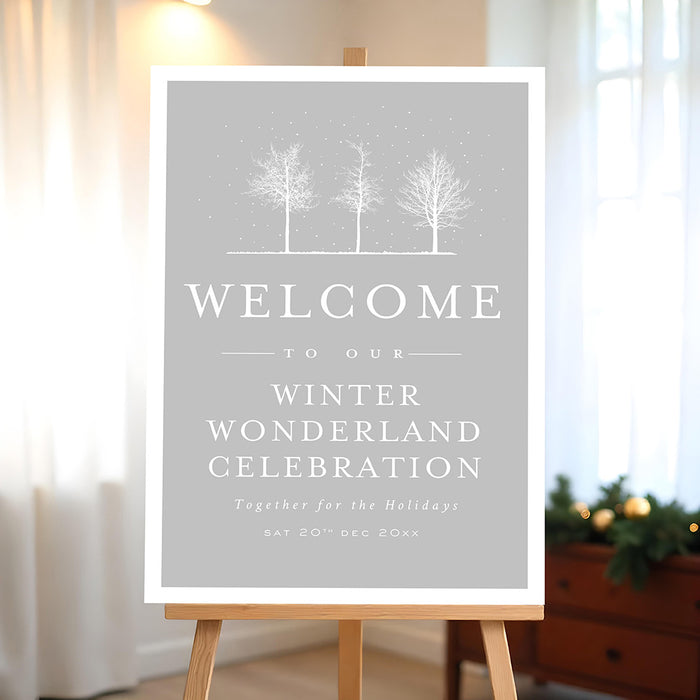 Winter wonderland welcome sign featuring snowy trees on a soft gray background, perfect entrance sign for holiday parties and winter celebrations.