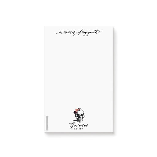 A white notepad with an illustration of a skull wearing a flower crown, and text that reads 'In Memory of my Youth'. The notepad is customizable with a name and has a subtitle 'Death to my 20s Birthday Party Favor Pad'.
