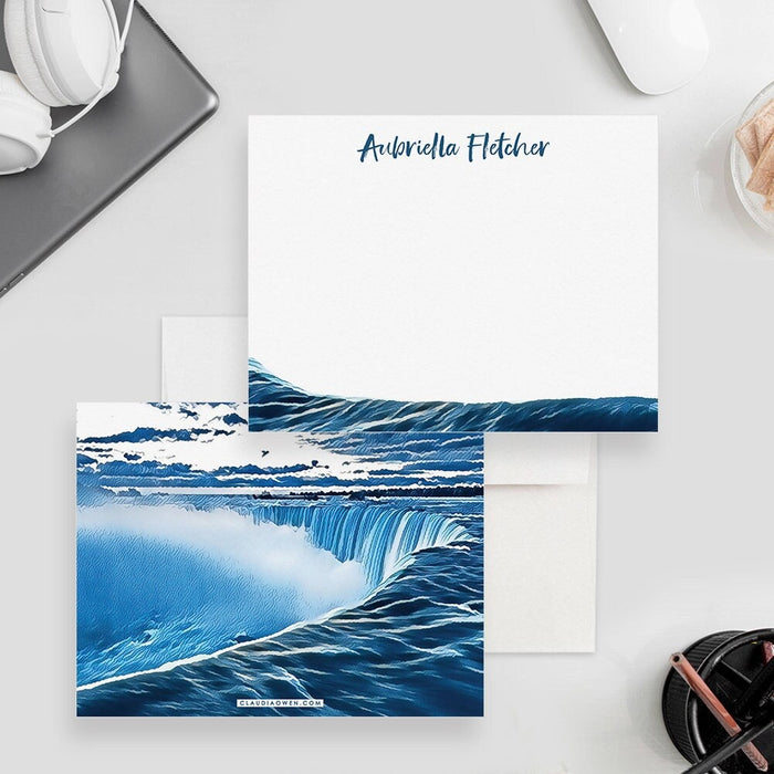 Niagara Falls note cards with a blue waterfall border and personalized name on the white front, and a blue waterfall scene across the back.