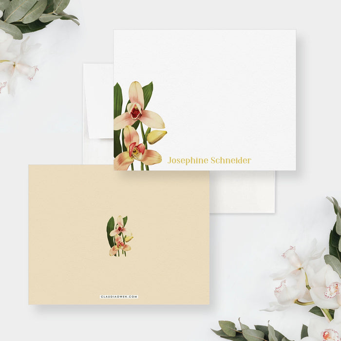 Front and back of orchid note cards: peach flowers and a printed gold name on white, with a small orchid on a cream background.