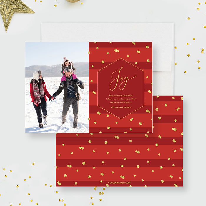 Red holiday photo card featuring a modern Joy design, gold confetti accents, and space for a family photo